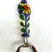 Bottle opener in steel and ceramic