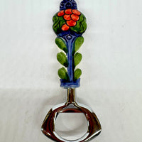 Bottle opener in steel and ceramic