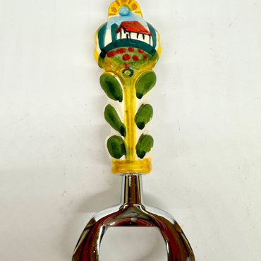 Bottle opener in steel and ceramic