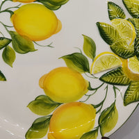 Large round tray with handles with relief lemon decoration