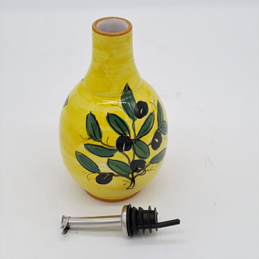 Olive Oil Cruet With Yellow Background