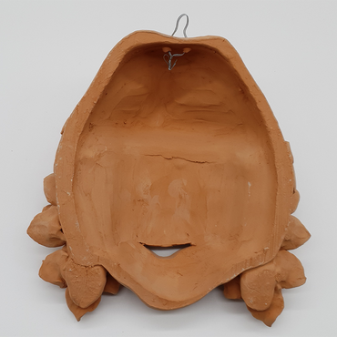 Maschera contadino frutta in terracotta