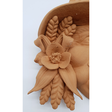 Peasant mask with poppies and ears of wheat in terracotta