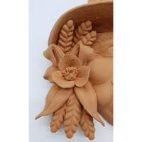 Peasant mask with poppies and ears of wheat in terracotta