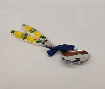 Pair of serving cutlery with lemon decoration