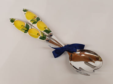 Pair of serving cutlery with lemon decoration