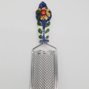 Sunflower Cheese Grater blue background Steel and Ceramic