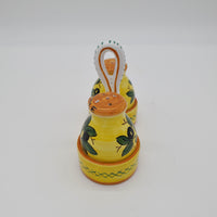 Salt and Pepper Set with Olive Decoration Yellow Background