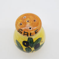 Salt and Pepper Set with Olive Decoration Yellow Background
