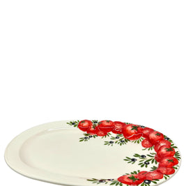 Vassoio con pomodori a rilievo e olive ovale
