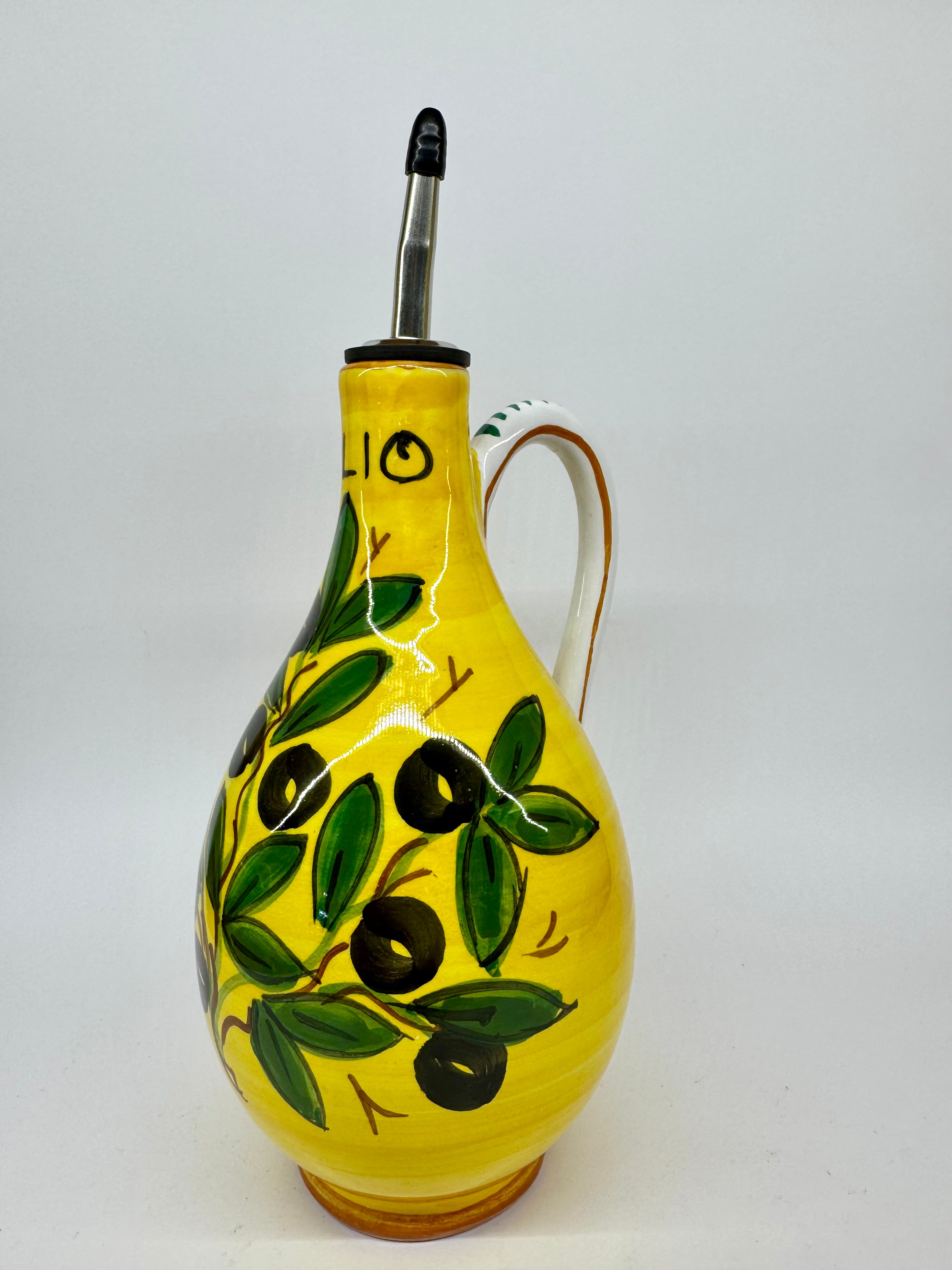 Olive Oil Cruet With Yellow Background