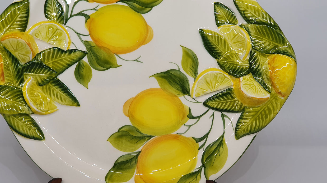 Large round tray with handles with relief lemon decoration