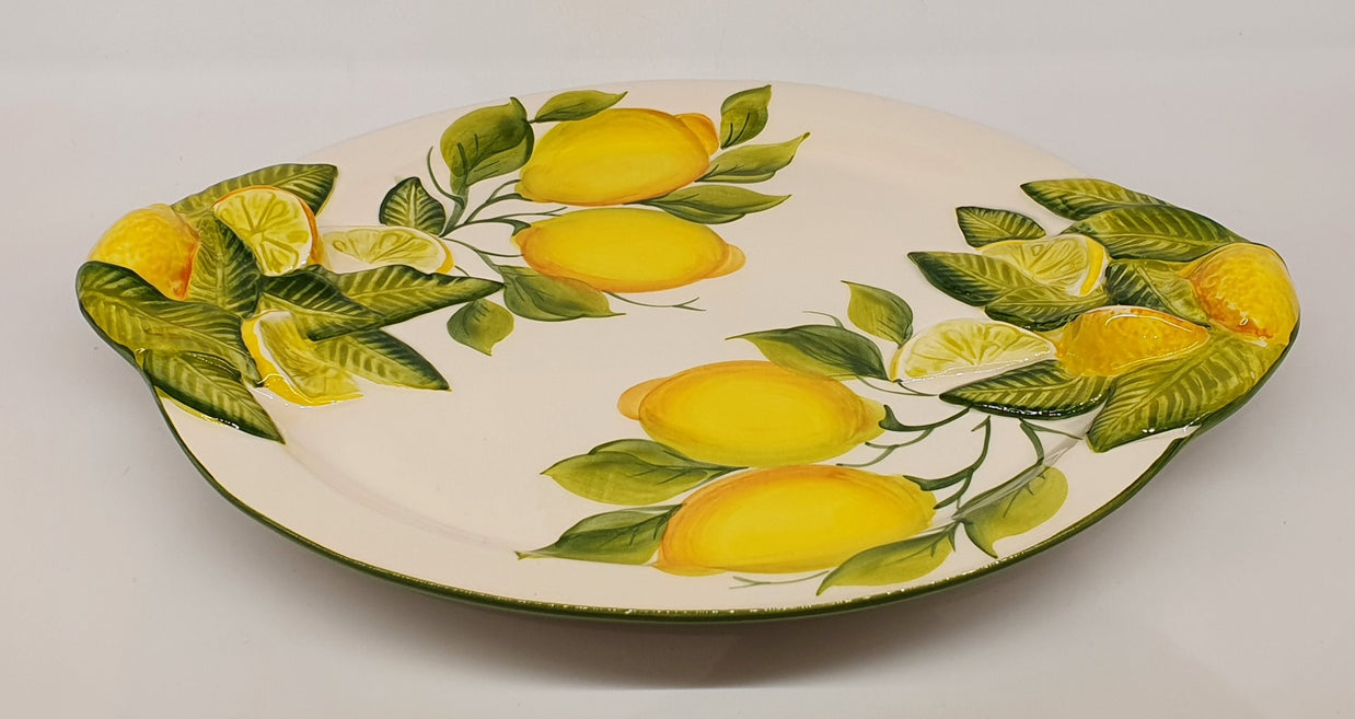 Large round tray with handles with relief lemon decoration