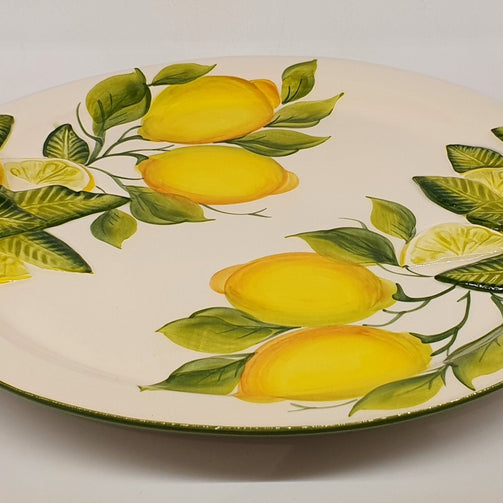 Large round tray with handles with relief lemon decoration