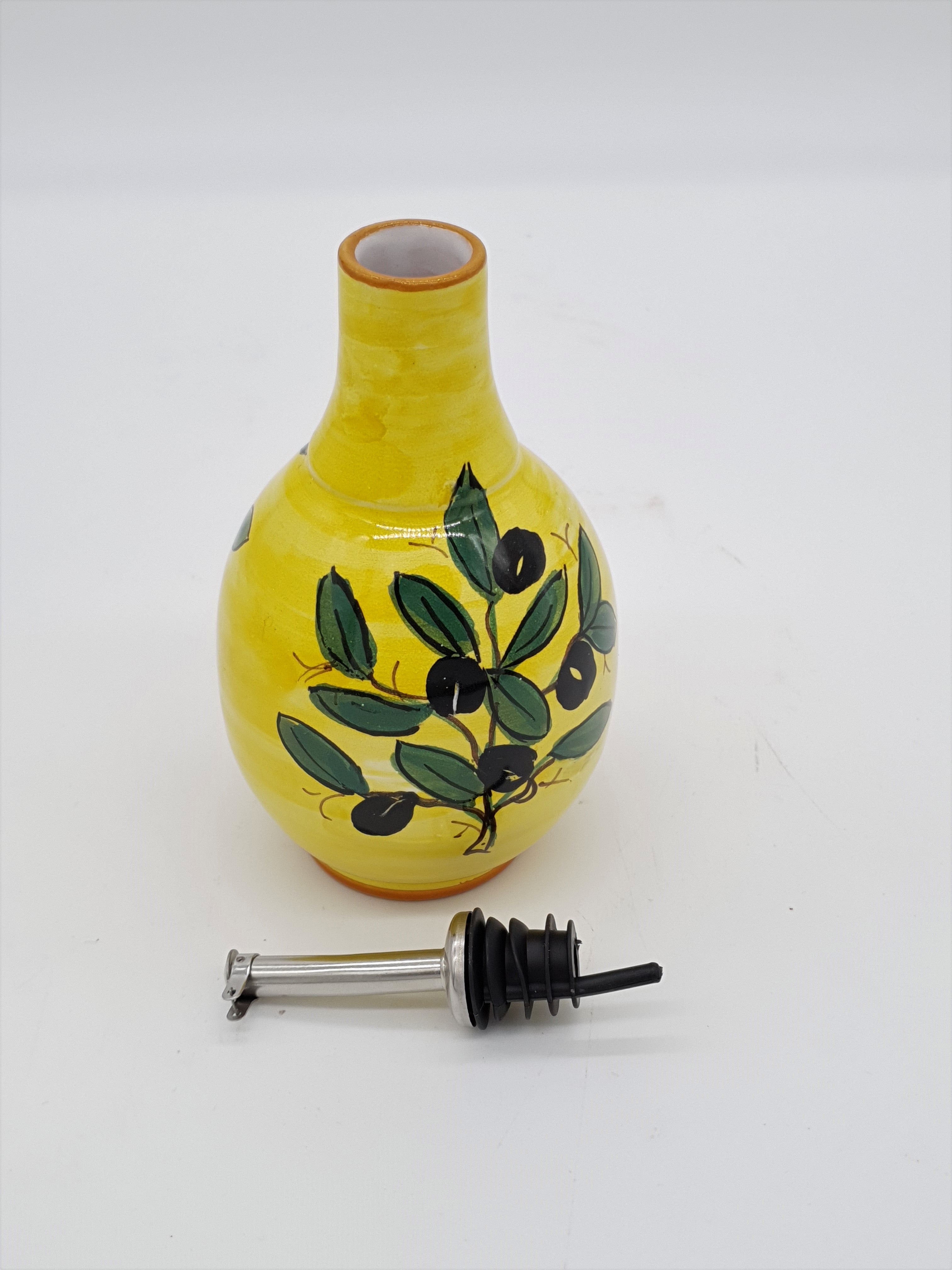 Olive Oil Cruet With Yellow Background