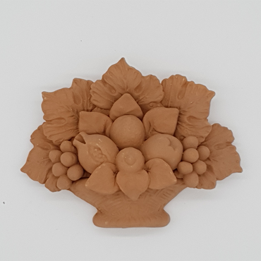 Basket with fruit in terracotta