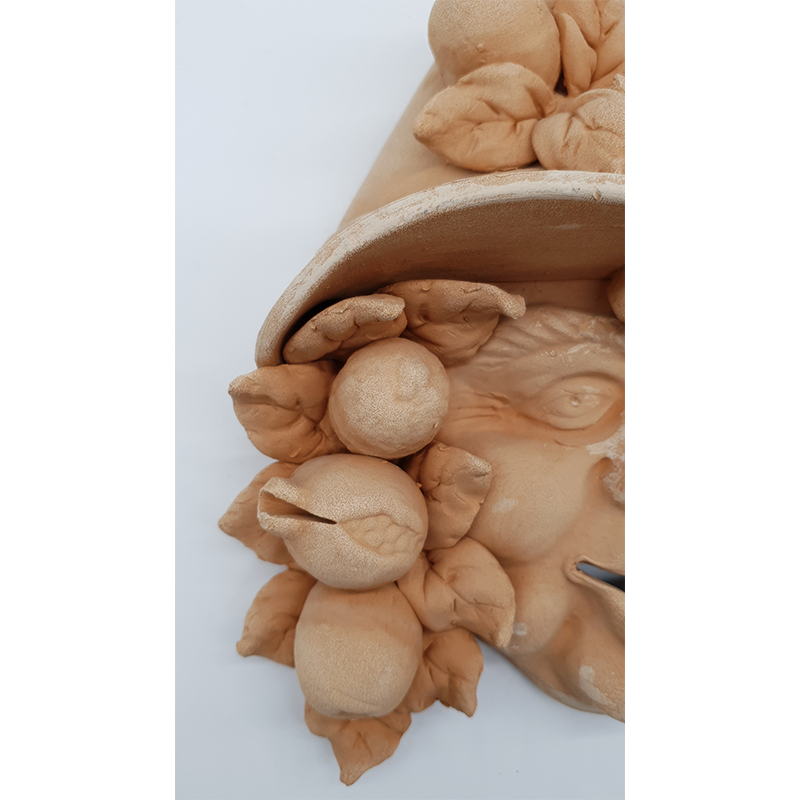 Maschera contadino frutta in terracotta