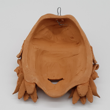 Peasant mask with poppies and ears of wheat in terracotta