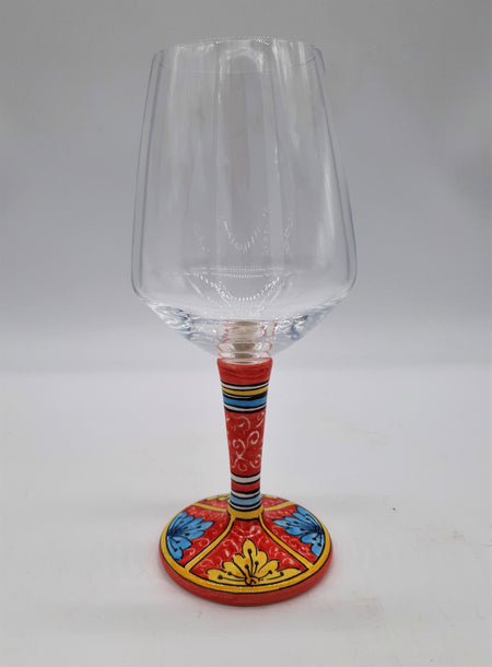 Wine Glass Ceramic and Glass Blue and Yellow Leaves Red Background