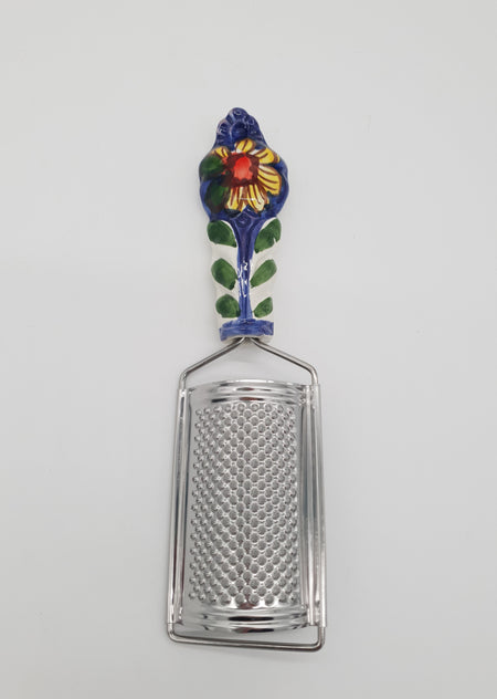 Sunflower Cheese Grater blue background Steel and Ceramic