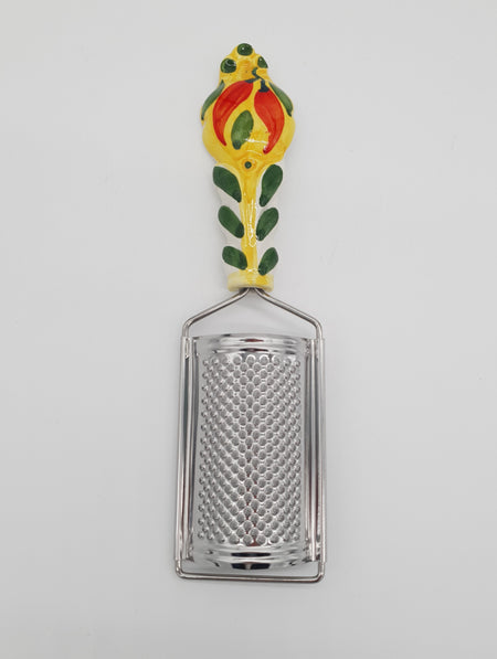Chilli Cheese Grater Yellow Background Steel and Ceramic