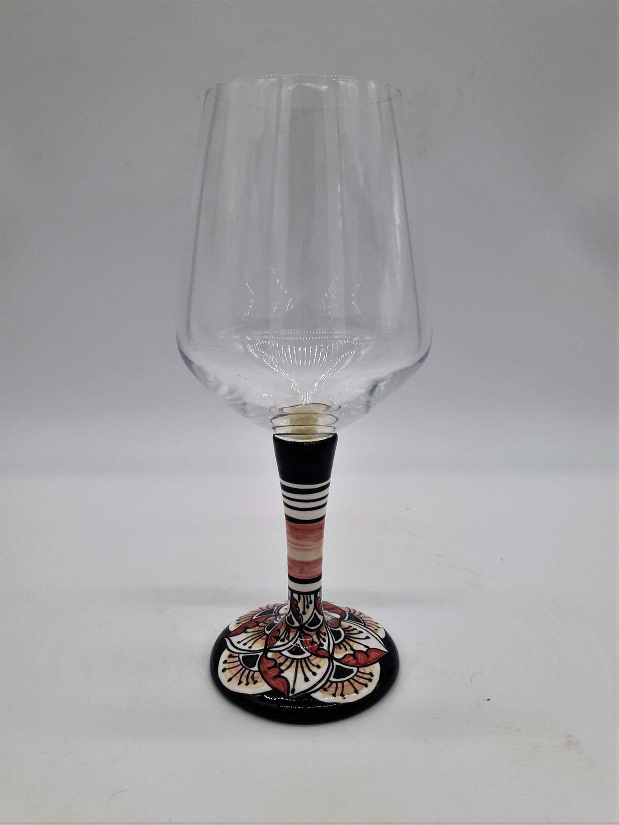 Glass for Wine Ceramic and Glass Peacock Feathers Black Background