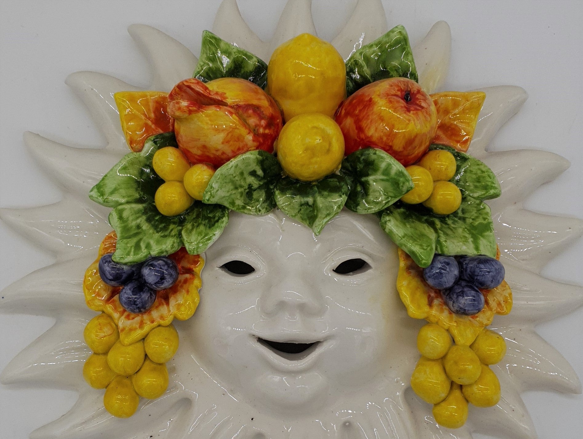 Sole con Frutta Applicata Ceramica